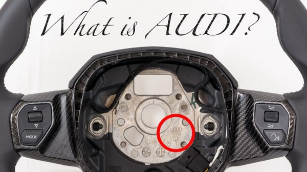 Aventador имеет на руле, не заметную, маленькую, чуть обидную эмблемку ауди