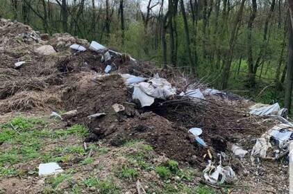 У Мурованокуриловецькій громаді ліквідували стихійне сміттєзвалище на вимогу екоінспекції